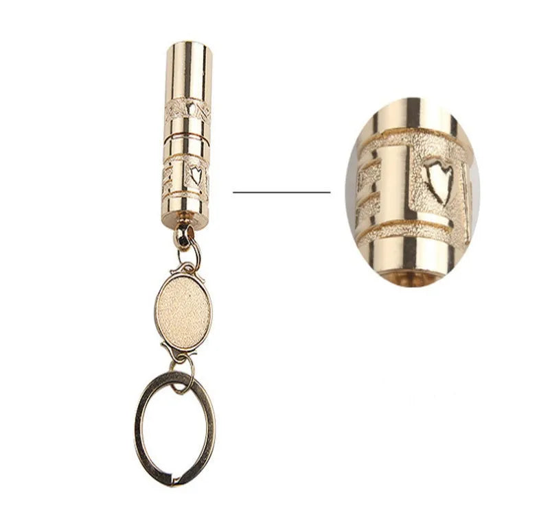 Gold zinc alloy waterproof LED keychain torch for outdoor and emergency use.