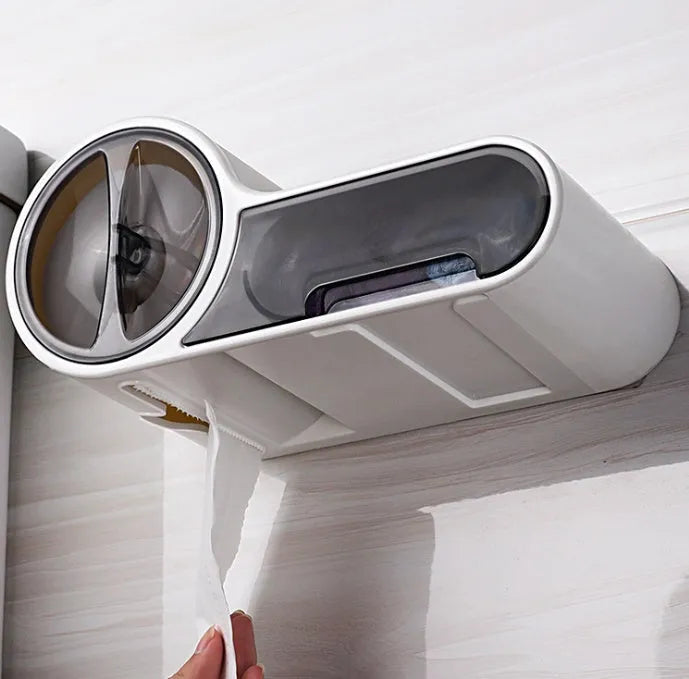 White plastic bathroom roll holder with streamlined curve design mounted on wall