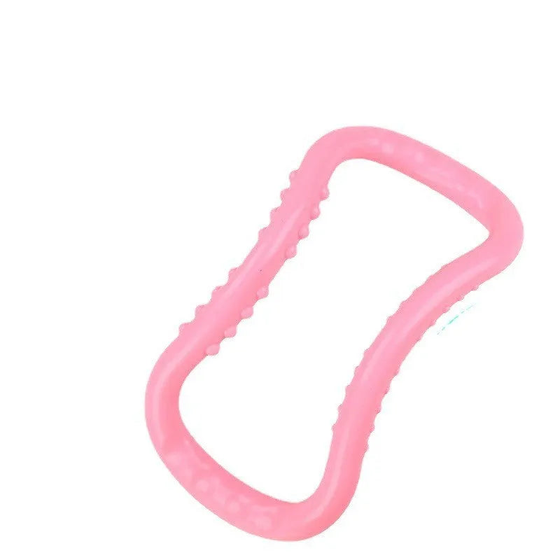 A purple, blue, or pink PP plastic yoga ring used for stretching and back opening exercises.