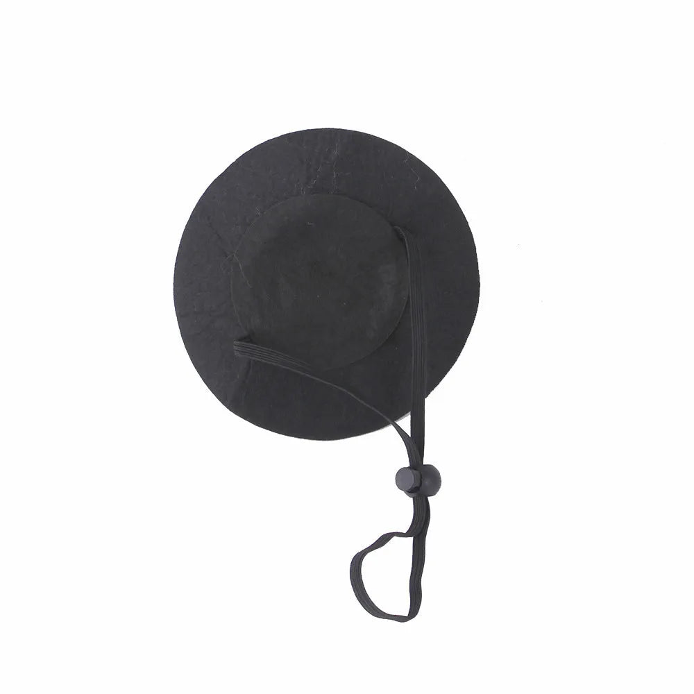Halloween cat hat in pumpkin smiling face design made from soft cloth with embossed detailing