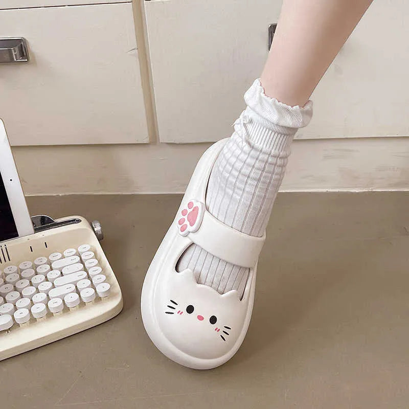 Cartoon closed-toe EVA slippers in white with thick non-slip sole