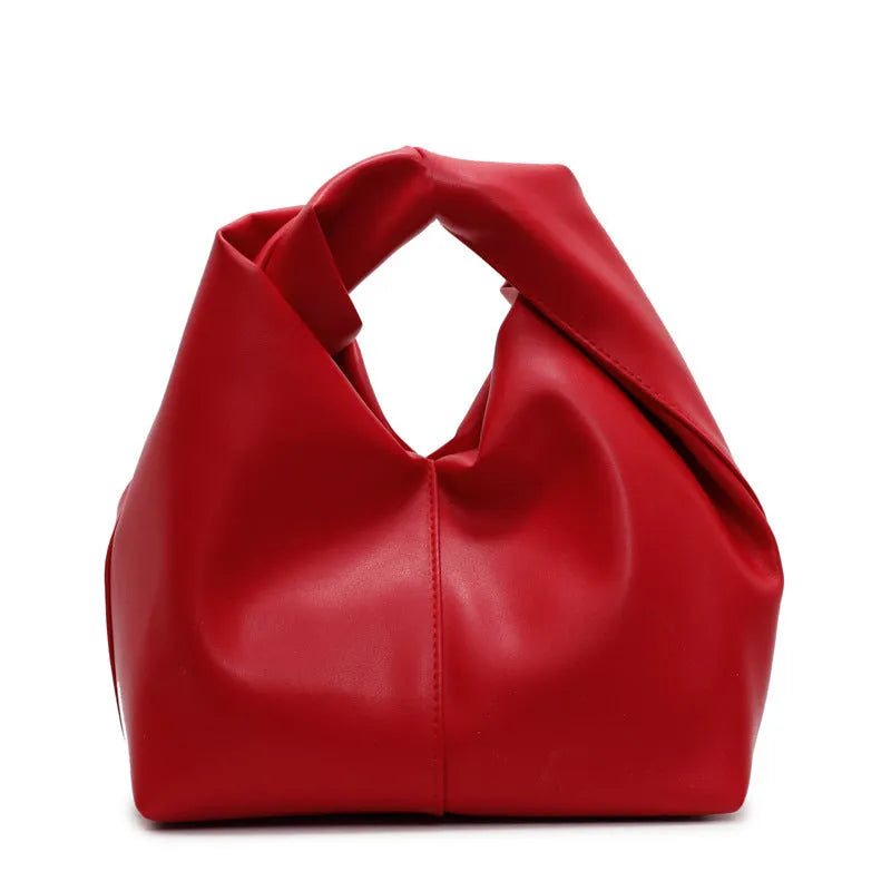 Women's PU leather dumpling-shaped handbag in multiple colours with folding stitch details measuring 24x10x21cm