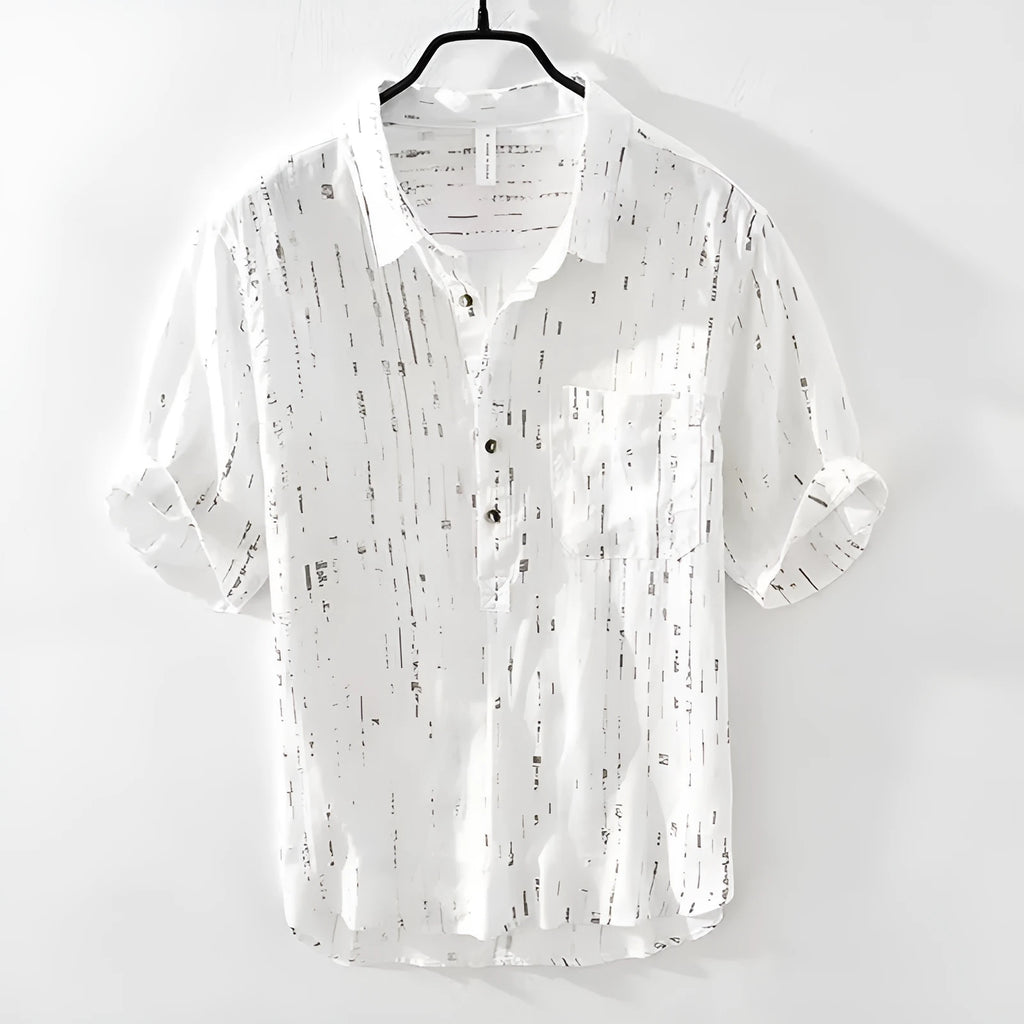 Men's loose fit short sleeve polo shirt in black, shown on a model.