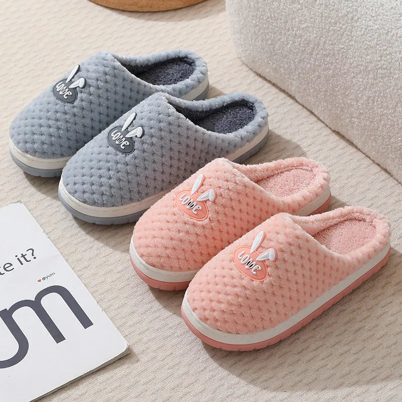 Women's plaid design artificial fur house slippers with a thick rubber non-slip sole in apricot colour