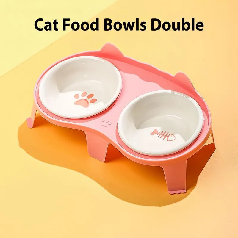 Blue ceramic cat food and water bowls on a white elevated plastic stand with hook design.