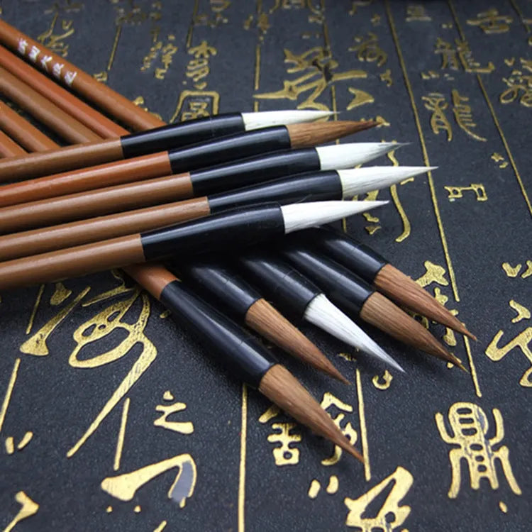 Three synthetic cloud brushes with solid wood or bamboo handles in S, M, L sizes on a white background