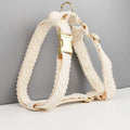 Four-piece dog wedding accessory set with lace collar vest, matching leash, and decorative flowers