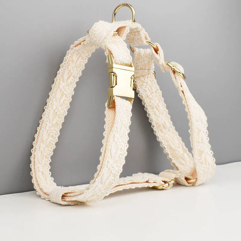 Four-piece dog wedding accessory set with lace collar vest, matching leash, and decorative flowers