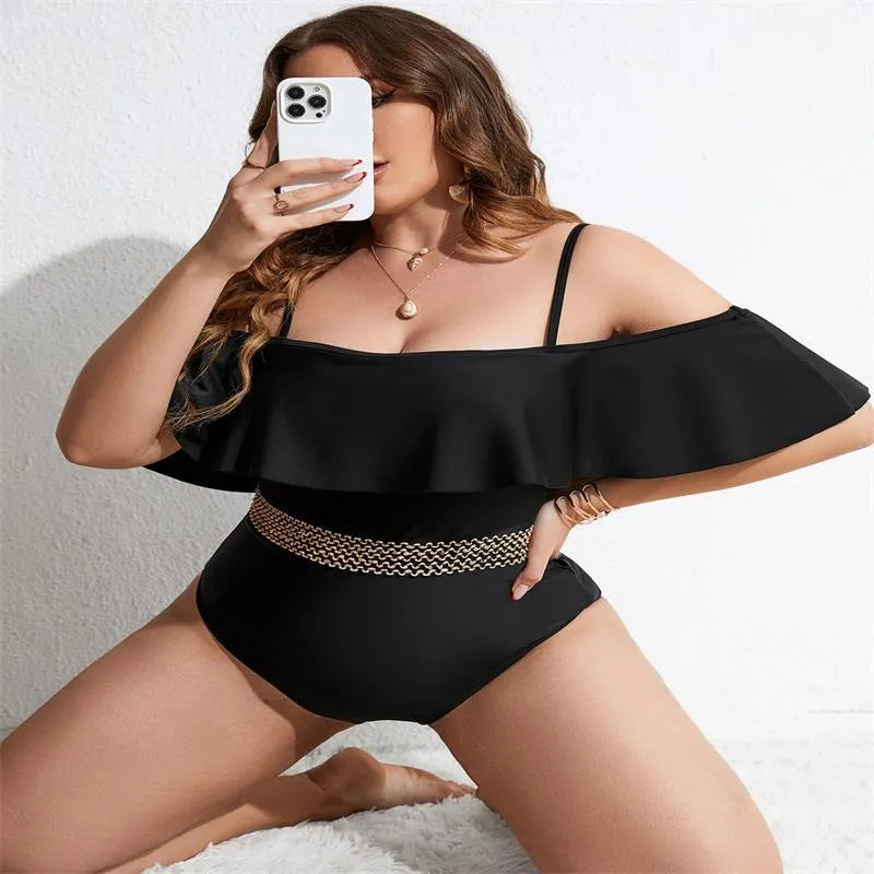 Black solid colour one-piece swimsuit for women on a mannequin