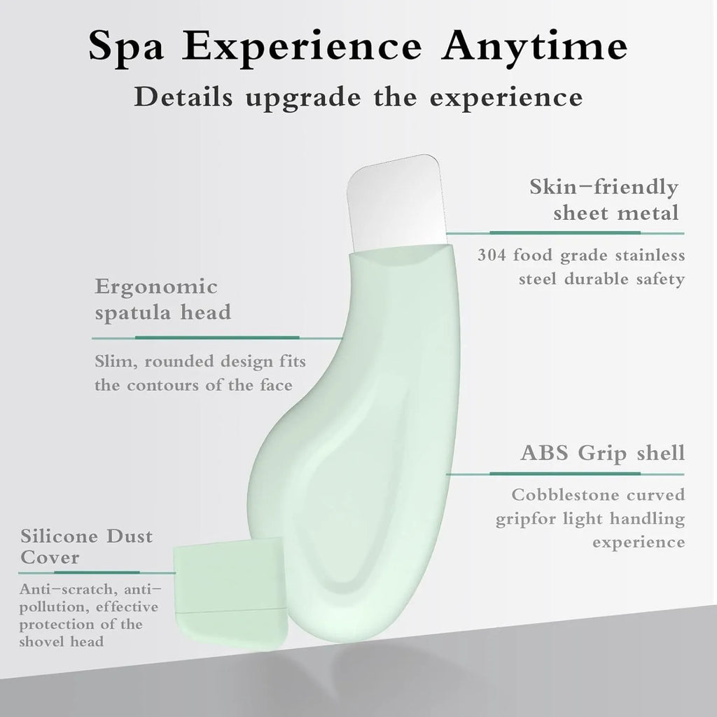 A stainless steel blackhead remover tool with a non-slip handle on a flat surface.