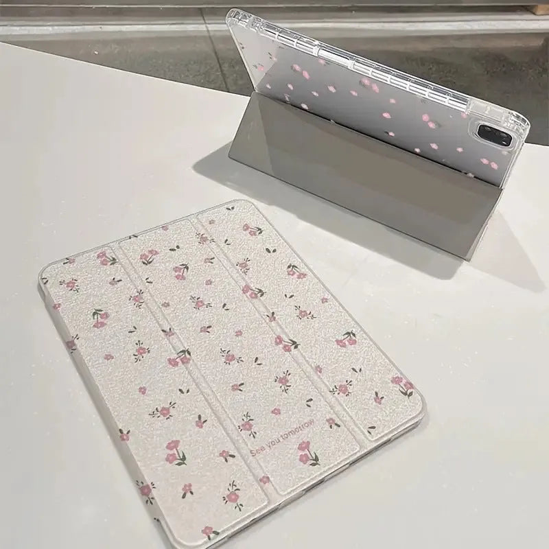 Transparent floral patterned iPad case with tri-fold magnetic stand open