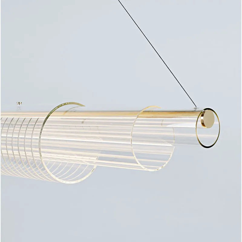 Minimalist modern glass pendant lamp with iron body in three hanging lengths.