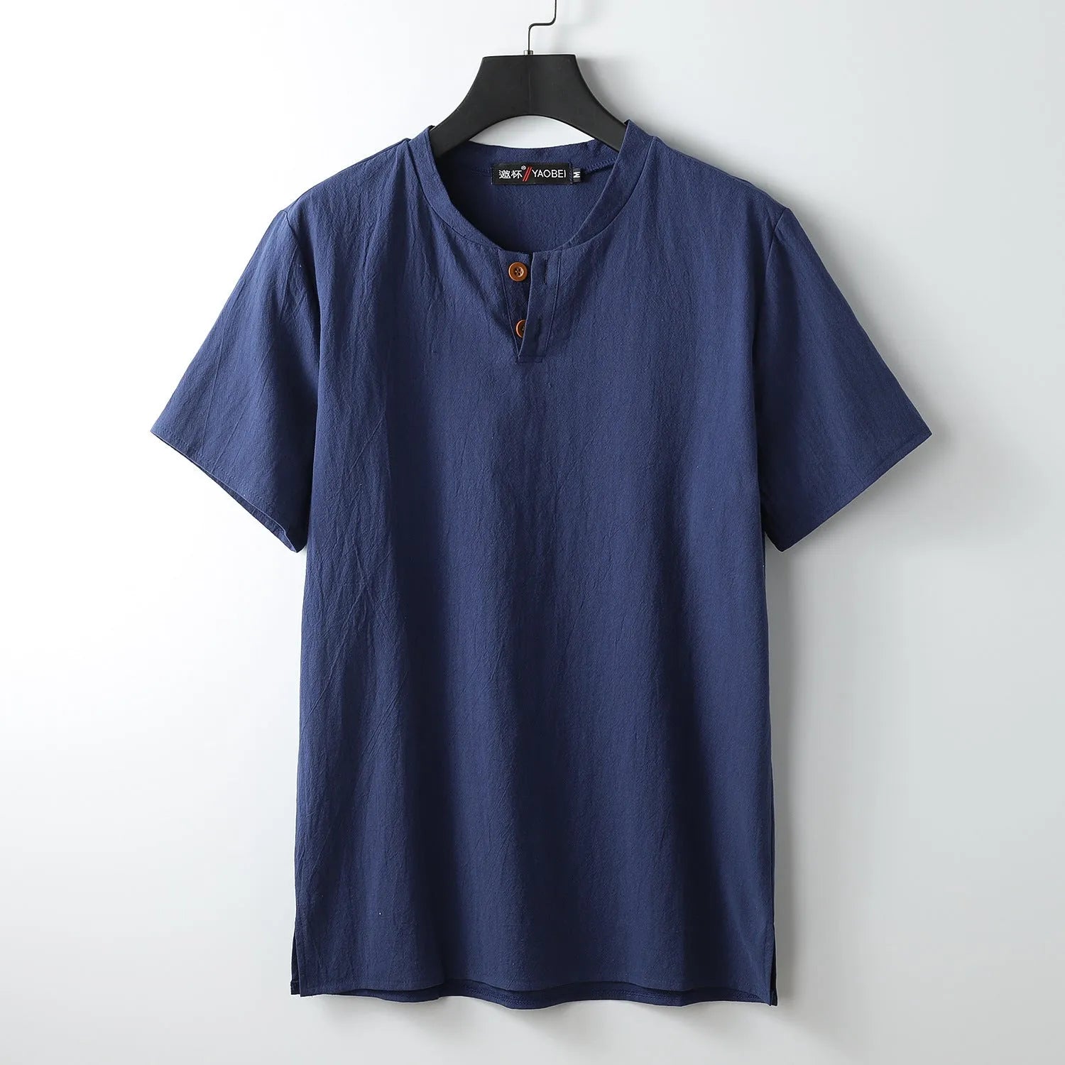 Loose fit cotton V-neck short sleeve summer top on a hanger