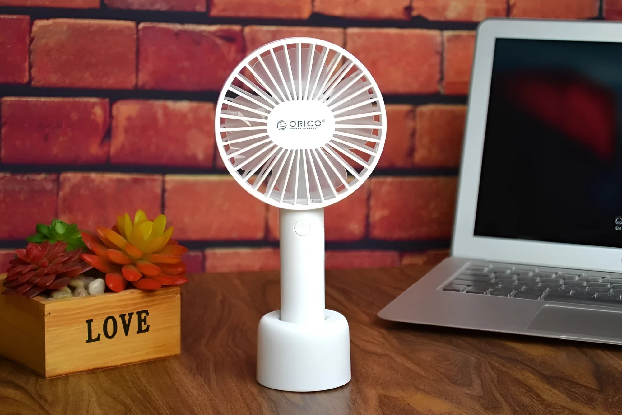 White USB rechargeable portable fan with three speed settings and 2000mAh battery
