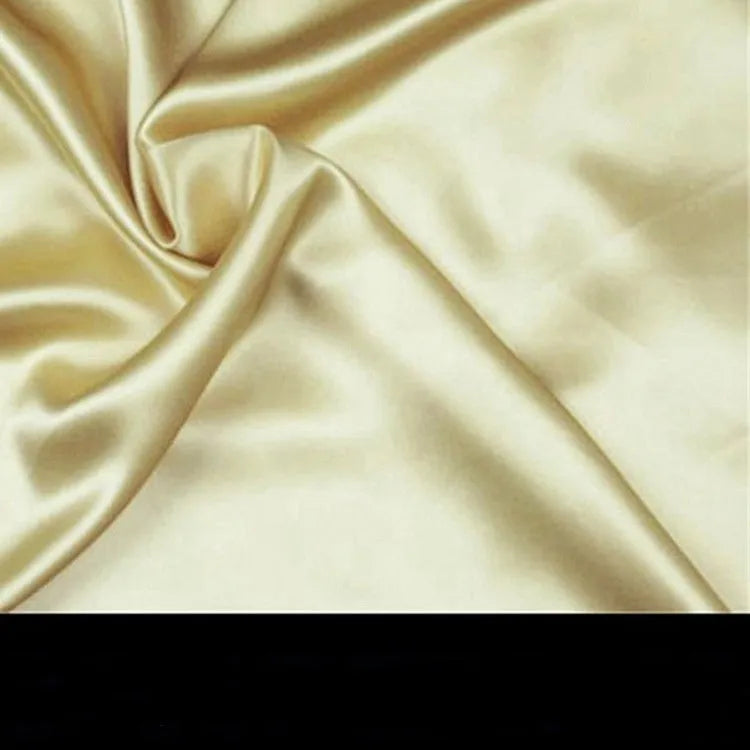 19 M double-sided silk pillowcase shown in one of 14 available colours, including apricot, sky blue, and black.