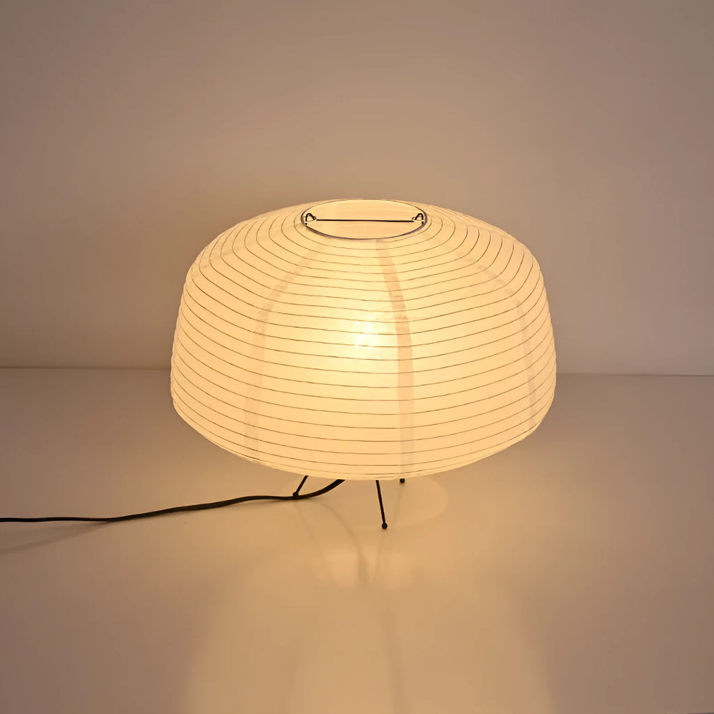 Japanese style xuan paper desk lamp with three-colour light source on a wooden desk in a bedroom
