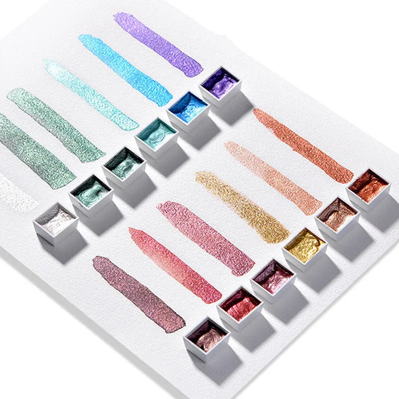 Boxed solid watercolour pigment set with pearlescent finishes in three colour system options