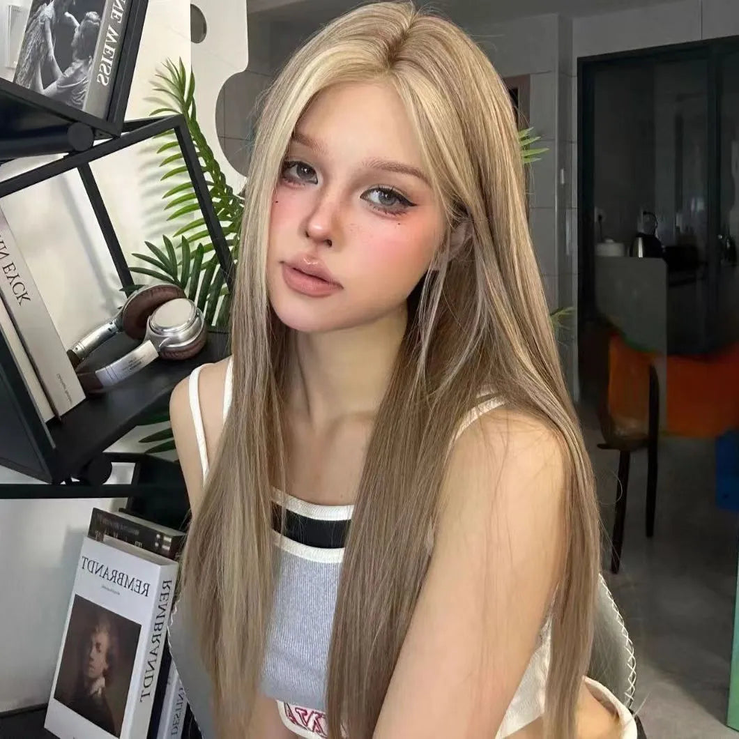 Women's forehead lace wig with golden brown gradient colour and centre-parted style