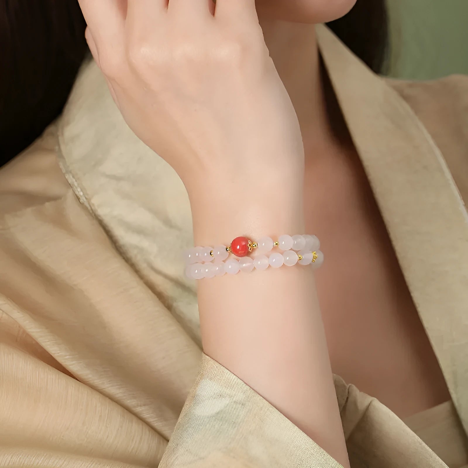 White agate double layer bracelet with jequirity bean cinnabar charm in geometric design