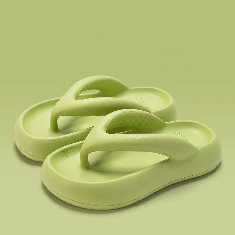 Women's thick-soled EVA flip-flops with a bow detail on the strap, shown in various colours.