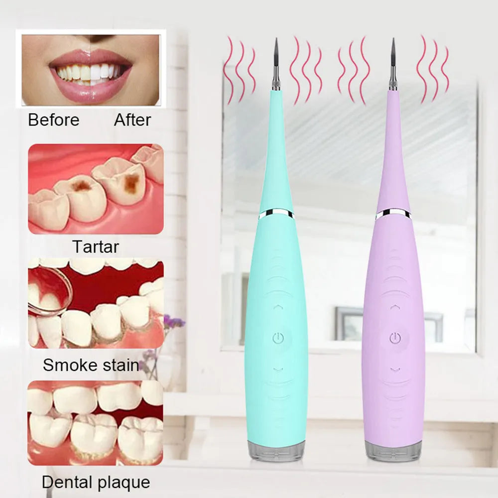 Pink and blue waterproof electric tooth scaler with integrated handle on a bathroom counter.