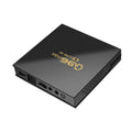 Q96 MAX S905 Android 4K TV Box set-top unit with remote control and cables on a black background.