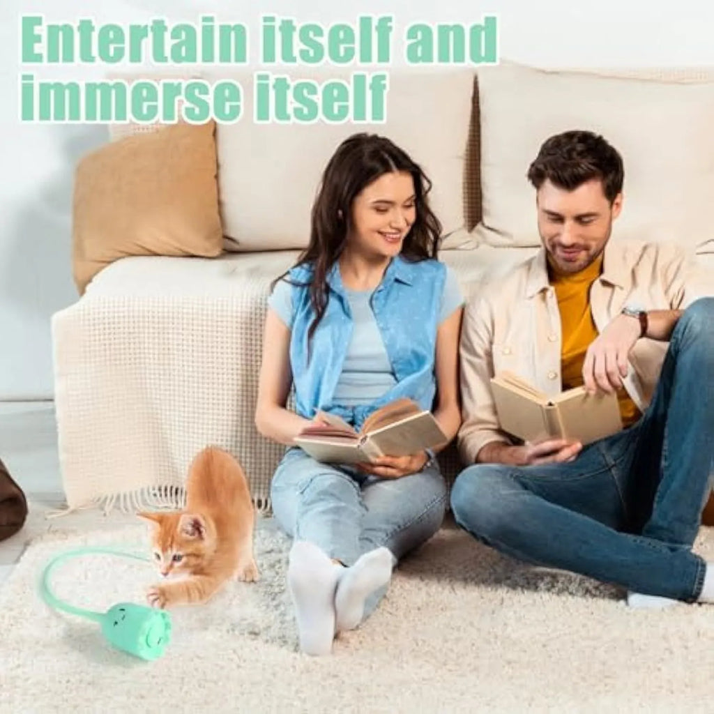 Automatic electronic cat wand toy with swinging silicone tails on green background
