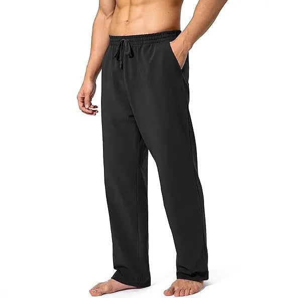Man wearing loose grey casual quick-dry trousers for sports leisure