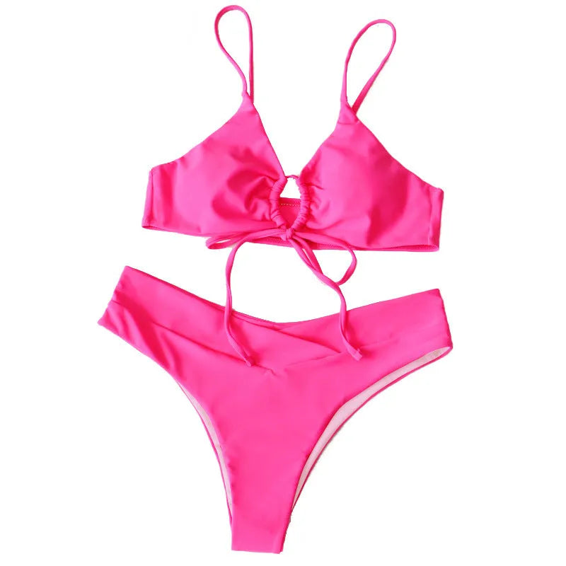 Women's pure colour bikini swimsuit with a tied bow detail, shown in one of eight available colours.