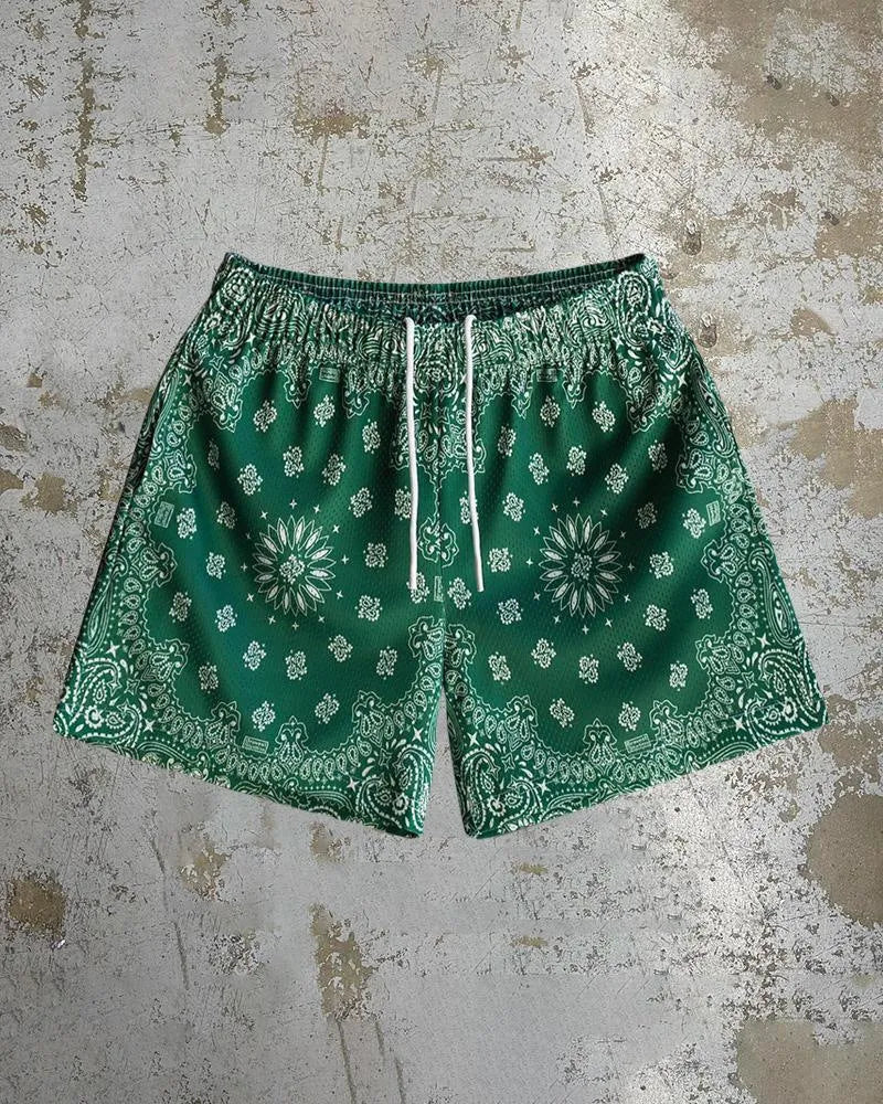 Men's quick-drying digital print beach shorts in loose fit, shown in one of ten available colour patterns.
