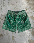 Men's quick-drying digital print beach shorts in loose fit, shown in one of ten available colour patterns.