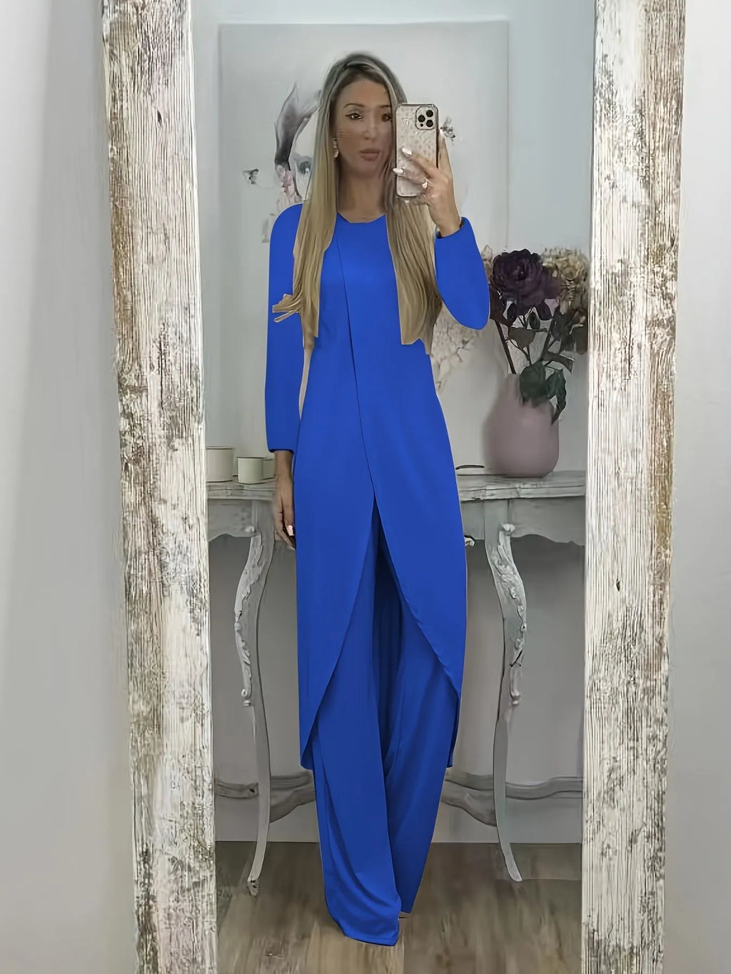 Casual two-piece clothing set with long sleeves and loose fit in black colour showing front view