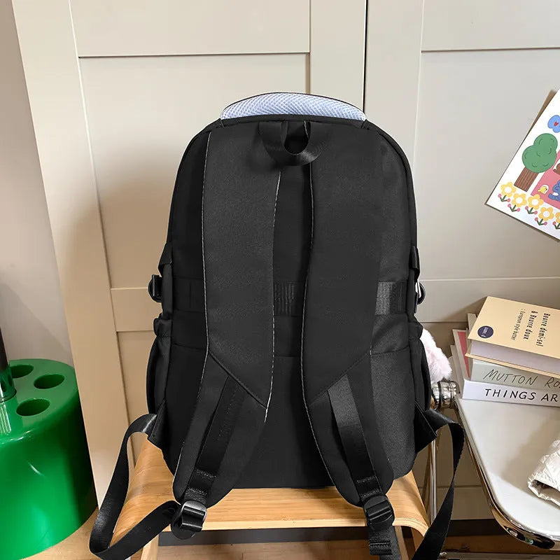 Waterproof nylon school backpack with curved shoulder straps in various colours