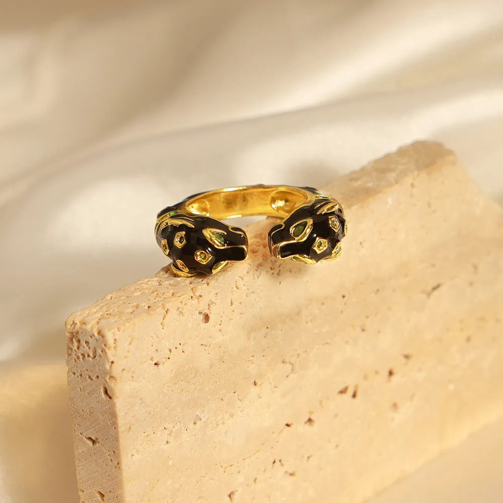 Women's copper cheetah print open ring with geometric design in black electroplated finish