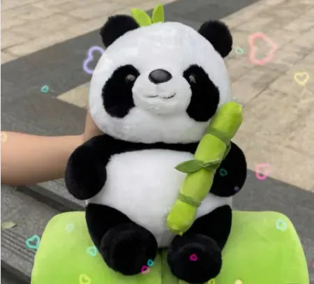 Black and white panda plush doll holding green bamboo tube, soft toy with PP cotton filling