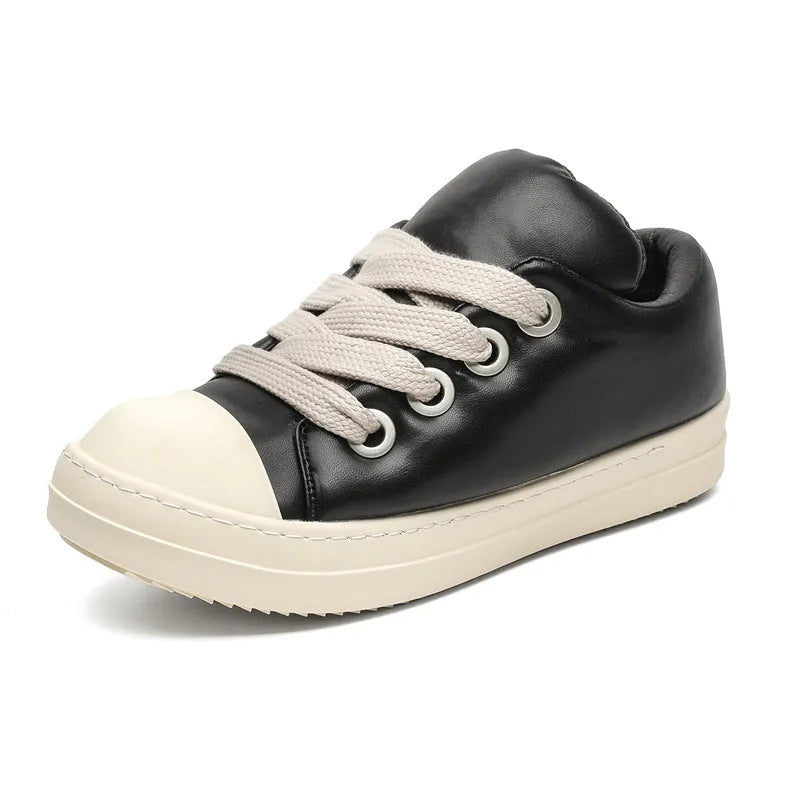 Men's black leather slip-on casual shoes with round toe and flat rubber soles