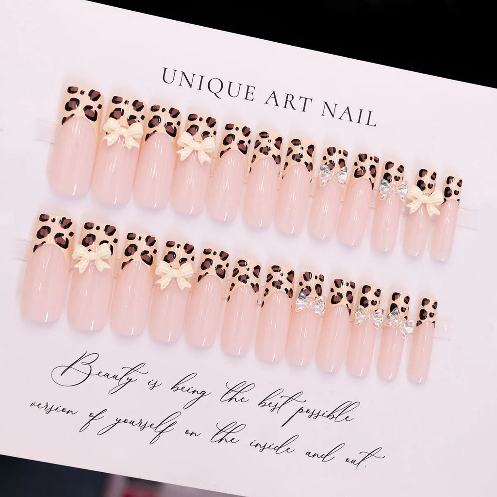 Leopard print butterfly nail art kit with plastic decorative tips in colour WM296