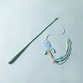 Blue cat teaser toy on a long pole with white feathers and an inflated ego component.