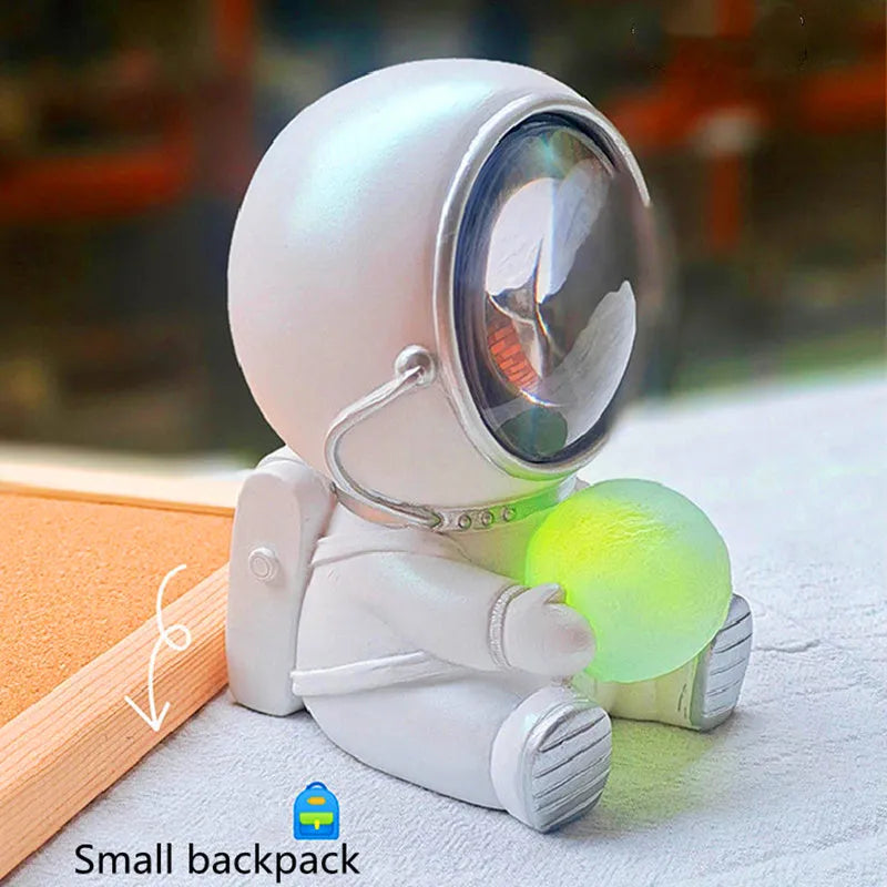Resin animal night light in bear design with starry sky LED glow on a table.