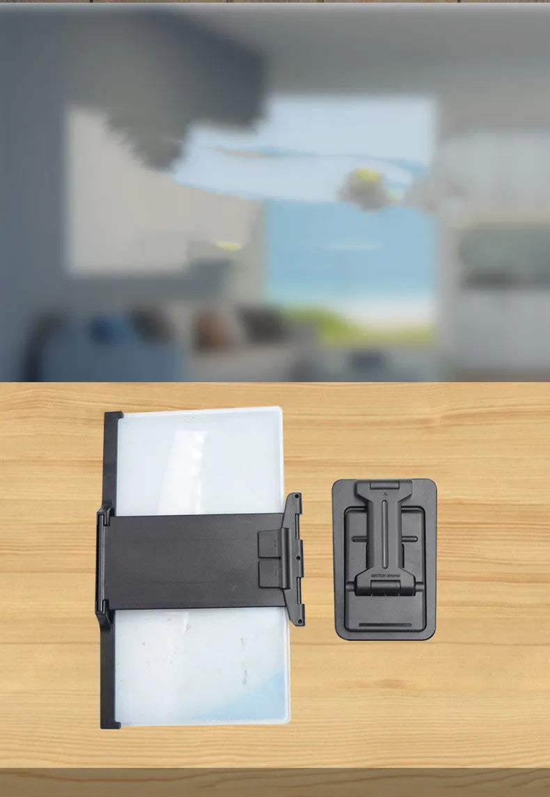 Black 12-inch mobile phone screen amplifier with detachable phone holder in folded position