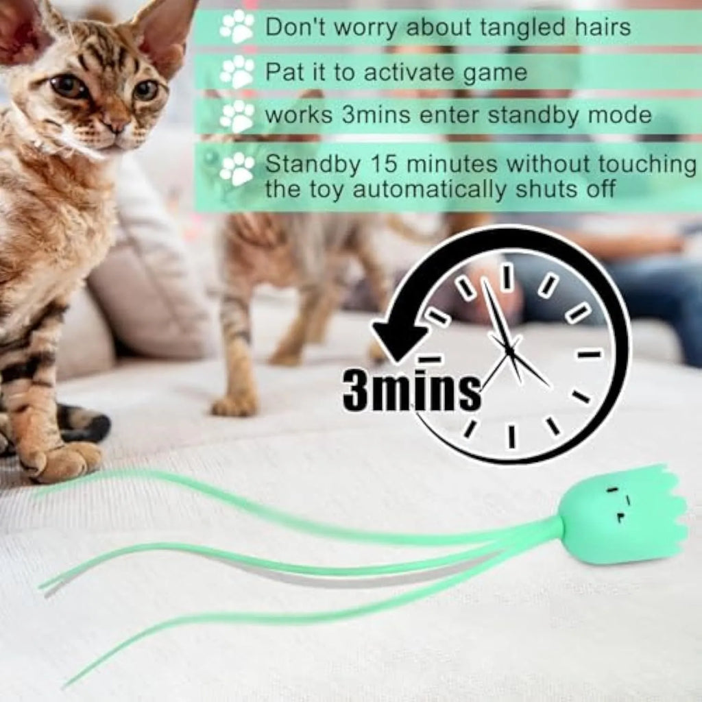Automatic electronic cat wand toy with swinging silicone tails on green background