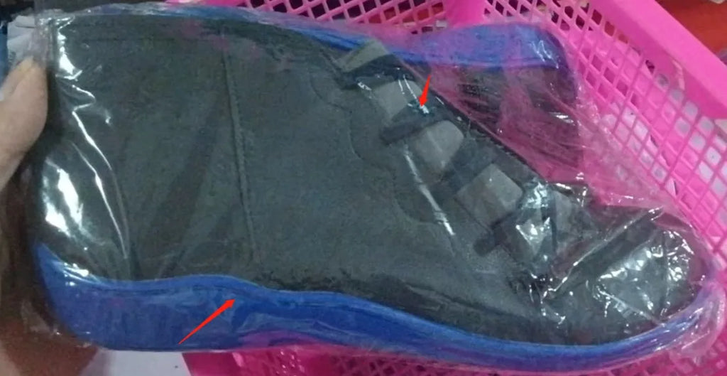 Women's black casual ankle boot with round toe, flat wedge heel, and rubber sole.