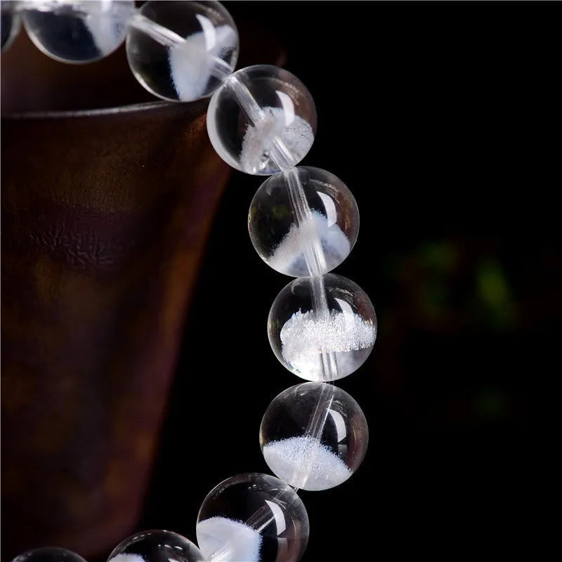 Women's natural white ghost pyramid bracelet with white crystal beads and a ruyi charm
