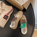Women's retro German training casual shoes in khaki with flat heel, round toe, and front lace-up design.
