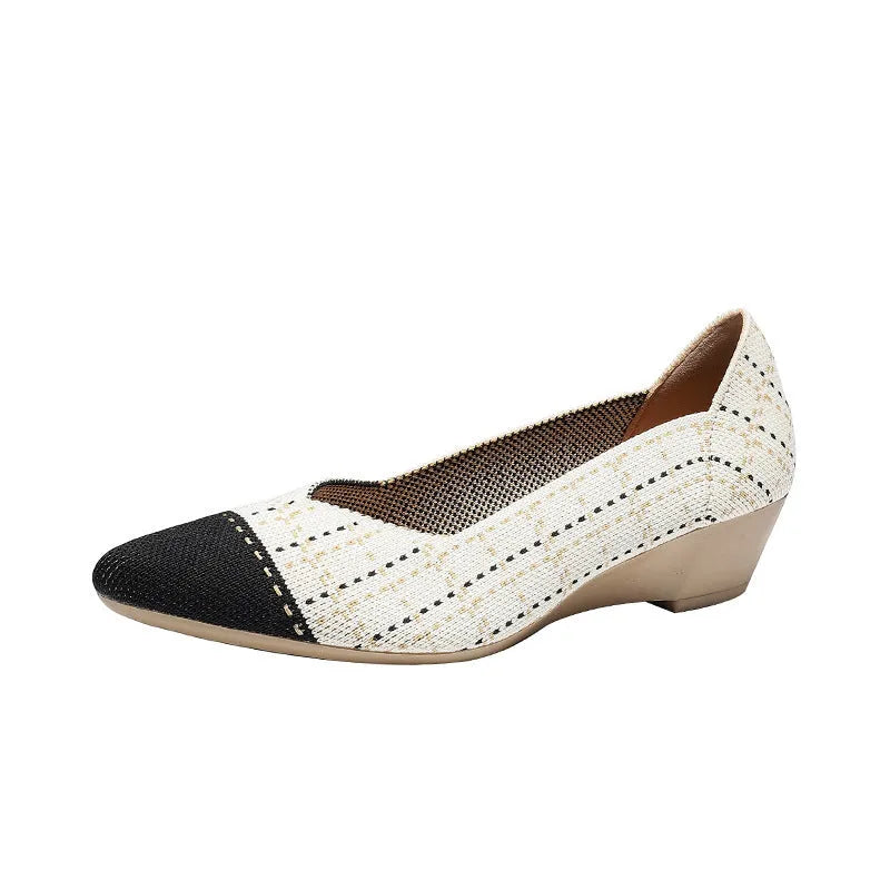 Women's beige Flyknit casual wedge shoes with a mid heel and shallow mouth on a white background.