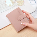 Women's lychee pattern short wallet in PU leather, shown in beige, pink, black, and red colour options.