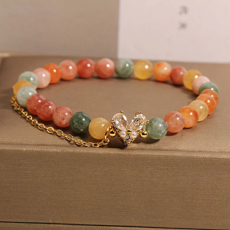 Fu Lu Shou crystal bracelet for women with gold tone metal settings and V-shaped zircon design
