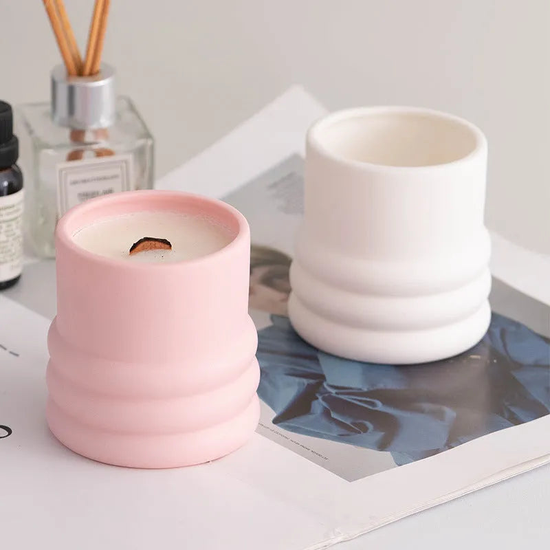 Minimalist relief ceramic candlestick round shape semi-handmade on dining table