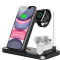 Folding 4-in-1 wireless charger in stand mode charging an iPhone and Apple Pencil.