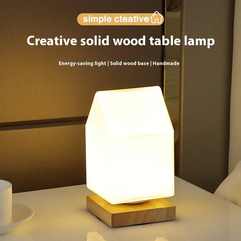Nordic solid wood USB charging table lamp with touch dimming and flower-shaped white shade.